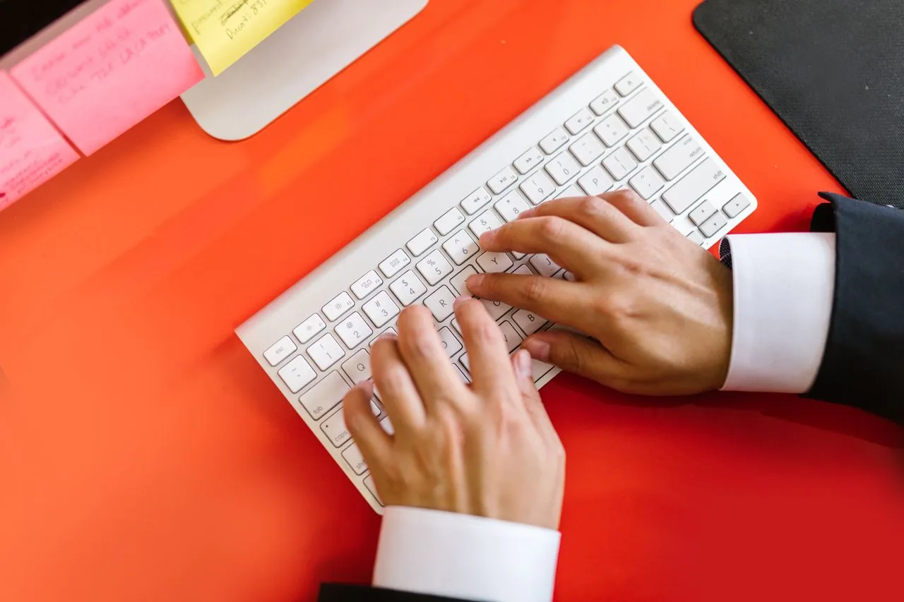 Recommendations being typed for a practical audit report